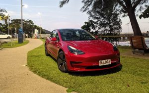 Tesla electric car rental Cairns Palm Cove jetty